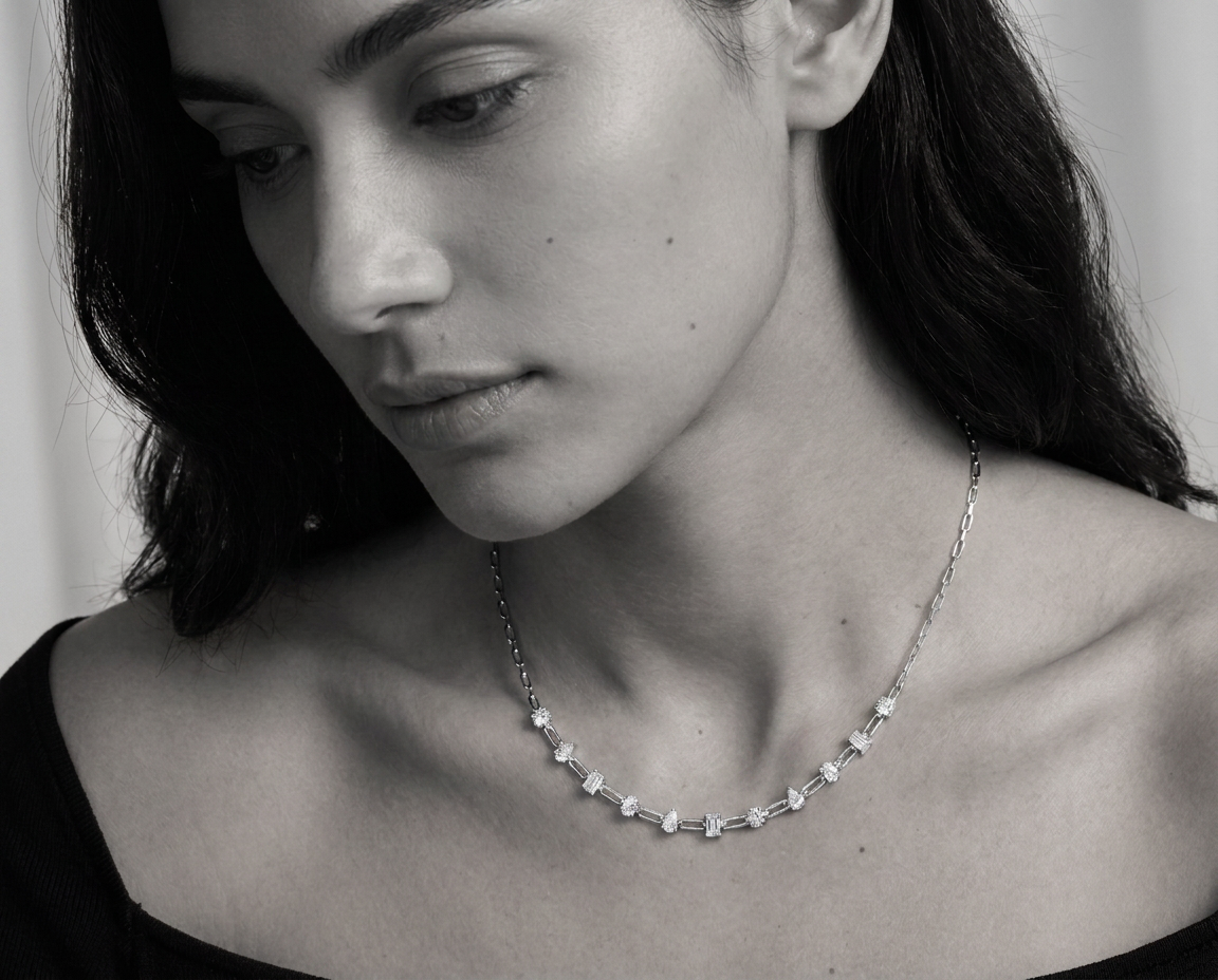 Black and white portrait of a model wearing the link multi fashion necklace
